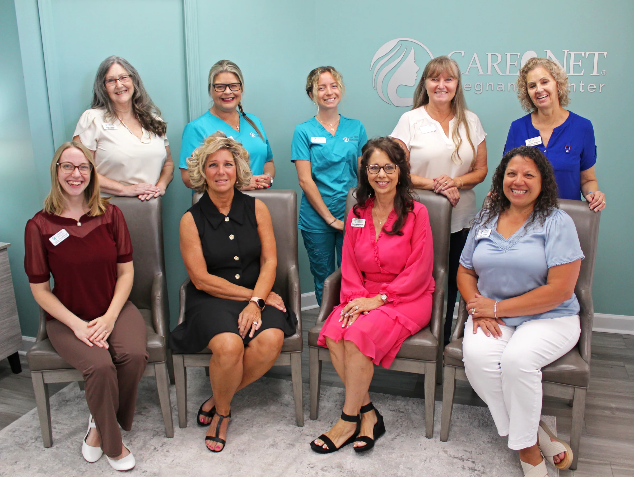 The Care Net IRC staff gathered inside the Vero Beach center